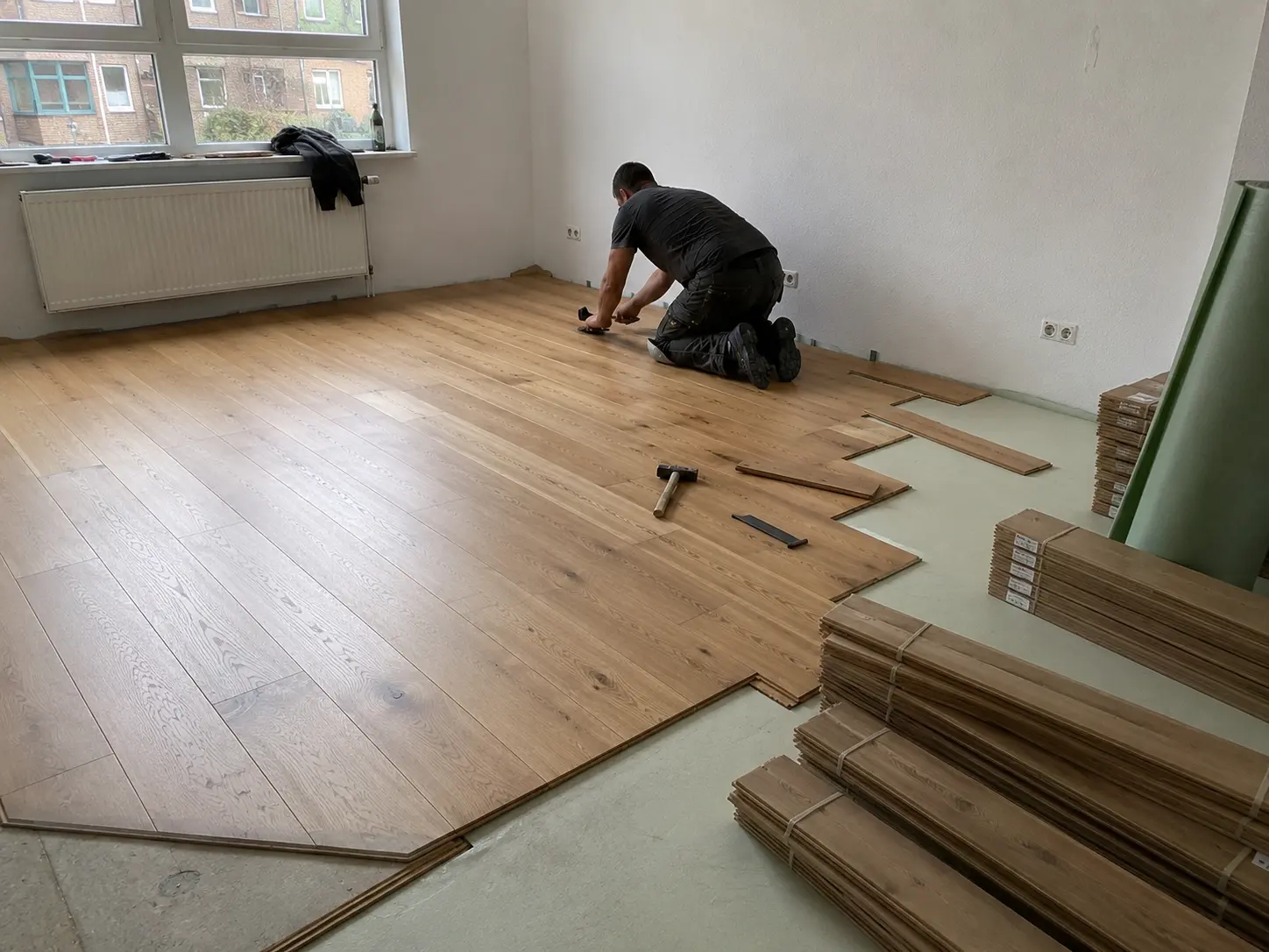 Parkett verlegen im Wohnraum Erfurt durch Maler Stelz GmbH